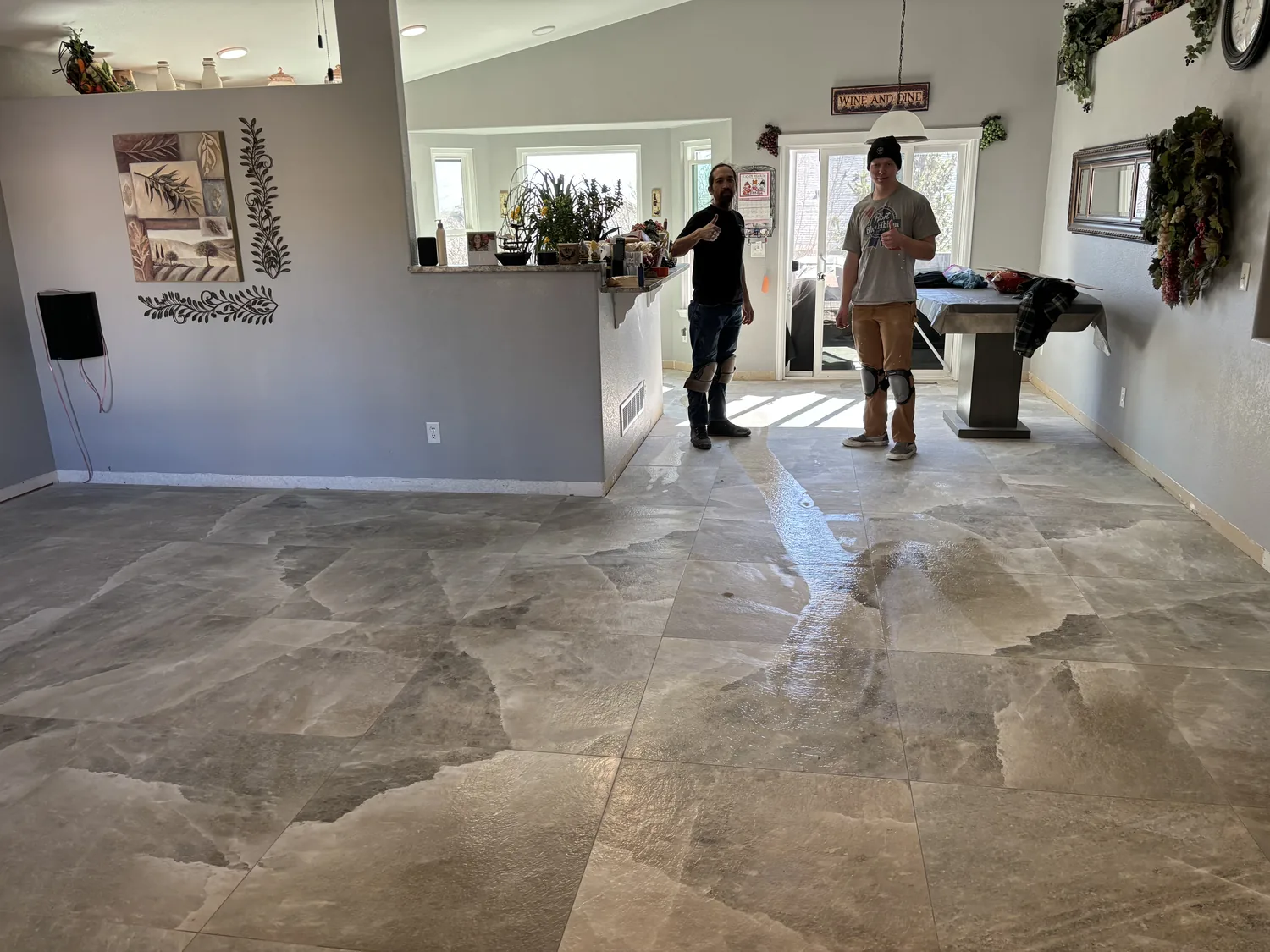 Finished room with large-format tile flooring